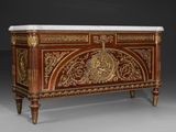 an ornately decorated chest with a marble top