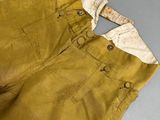 an image of a pair of yellow pants on a table