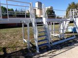 a ladder that is next to a pool in the yard