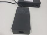 a black power supply that is sitting on a table
