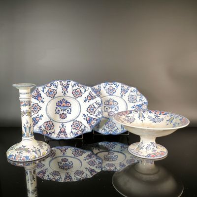 two plates and a bowl on a table