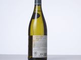 a bottle of wine that is sitting on a table