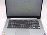 a laptop computer sitting on top of a white table