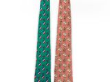two ties with different designs on them on a white background