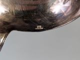 a spoon that is sitting on top of a table