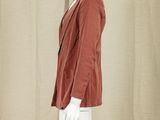 an image of a mannequin mannequin wearing a red sweater and white pants