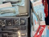 many items in a plastic container on a table