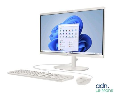 a computer monitor with a keyboard and mouse next to it
