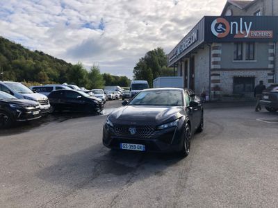 a car parked in front of a building with cars parked in front of it
