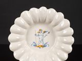 an image of a white plate with a cartoon character on it