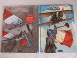 Deux livres sont posés sur une surface blanche ; l'un est un avion et l'autre est un avion.