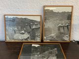 two framed photos of a man and a woman on a table