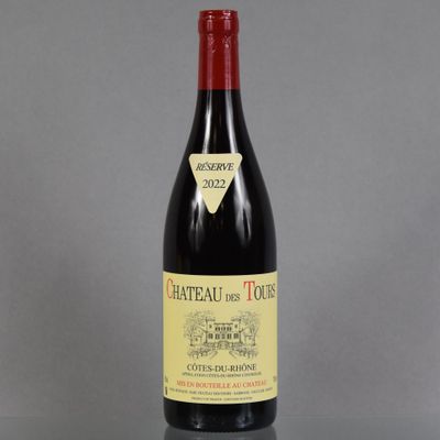 a bottle of wine that is sitting on a table