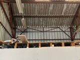 a picture of a building under construction with a lot of construction materials
