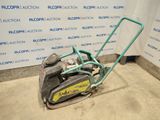 an image of a lawn mower in a garage