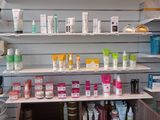 a shelf with many products on it in a store
