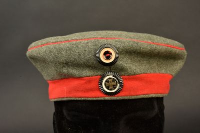 an image of a military hat with buttons on it