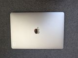 an apple macbook pro laptop sitting on top of a table