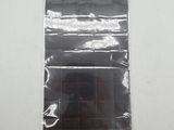 a picture of a piece of black plastic on a wall
