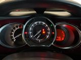 a close up of a car dashboard with a speedometer and gauges