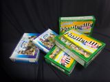 three boxes of cigarettes are sitting on a black surface