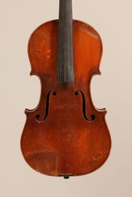 an old violin with a bow on a white background