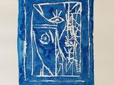 blue and white drawing of a woman ' s face in a window