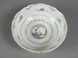 a white bowl with a picture of a boat on it