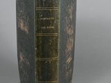 an old book sitting on top of a table