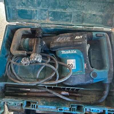a blue box with a hammer and other tools in it