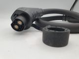a close up of a black cable connected to a gray cord