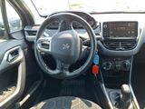 the interior of a car with a steering wheel and dashboard controls