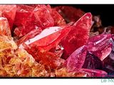 a close up of a television screen with a bunch of crystals on it