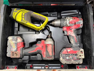 a box with tools inside of it on the floor