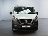 the front of a white van parked in a white room