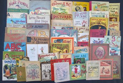 many children ' s books on display on a table