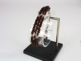 crystal bracelet display on black base with clear acrylic base