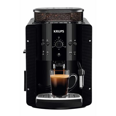 une machine à café noire avec une tasse de café devant elle
