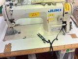 a sewing machine that is sitting on a table