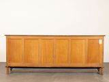 an image of a wooden bench in a room