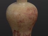 a picture of a small vase with a wooden lid