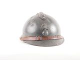 a helmet that is sitting on a white surface