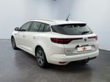 a picture of a white car in a showroom