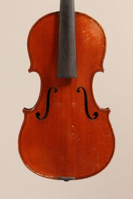 an old violin with a bow on a white background
