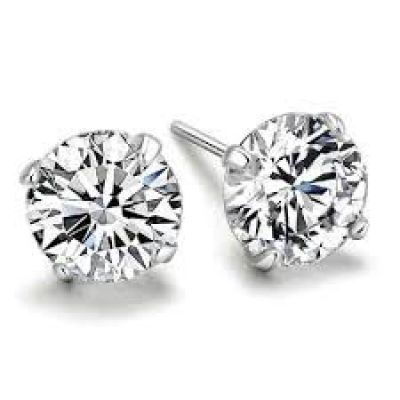 a pair of diamond stud earrings on a white background