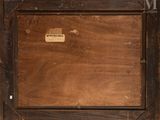 a picture of an old wooden box with a label on it