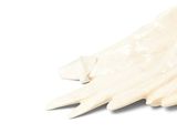a white bird that is sitting on a white surface