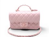 Mini sac à rabat Chanel en cuir d'agneau matelassé rose