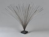 an image of a sculpture of a plant on a white surface