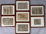 six framed drawings of people in various poses on a wall